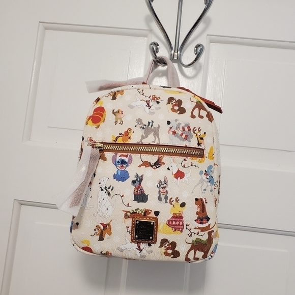 Dooney & Bourke Handbags - NWT Disney's Dooney & Bourke Holiday Santa's TAIL Backpack, collector's